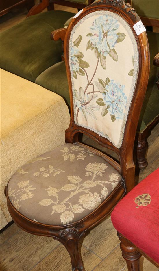 A Victorian mahogany nursing chair, with tapestry seat